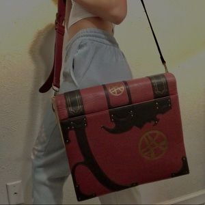Red,Gold and black bag ( Doctor Strange Book)